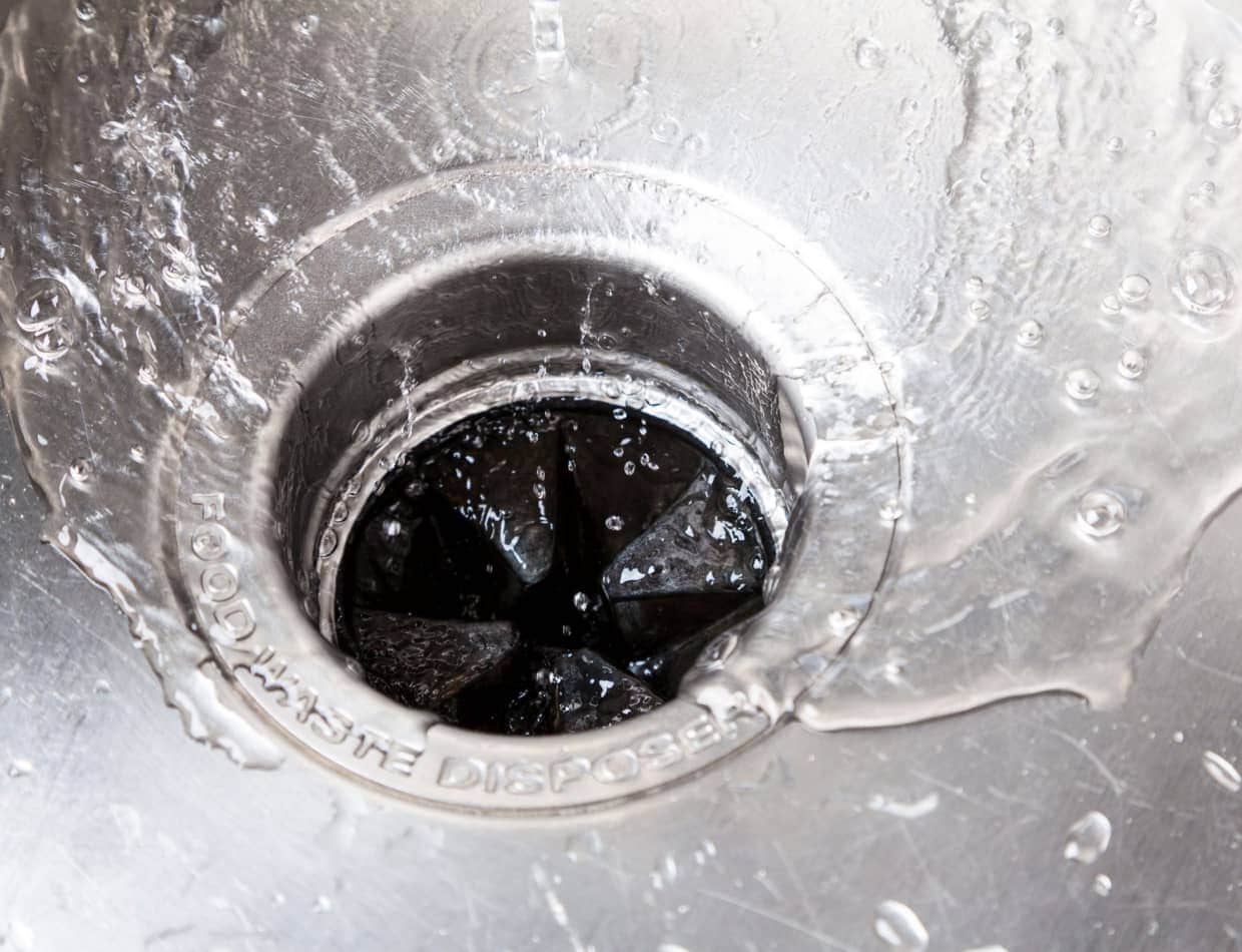 Kitchen sink drain with cleaning foam