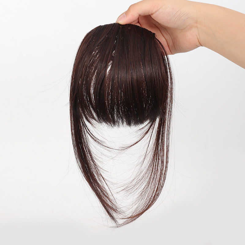 Fake bangs hairpiece for the top of the head