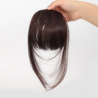 Fake bangs hairpiece for the top of the head