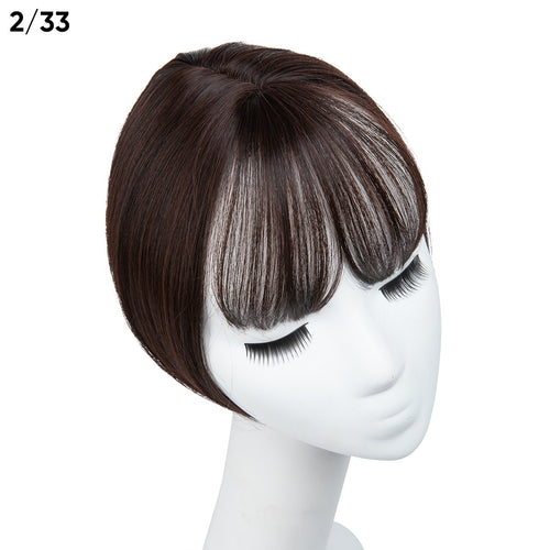 Fake bangs hairpiece for the top of the head