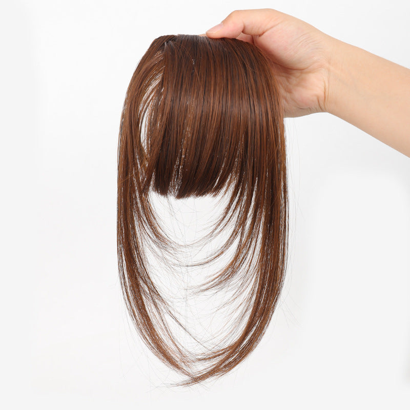 Fake bangs hairpiece for the top of the head
