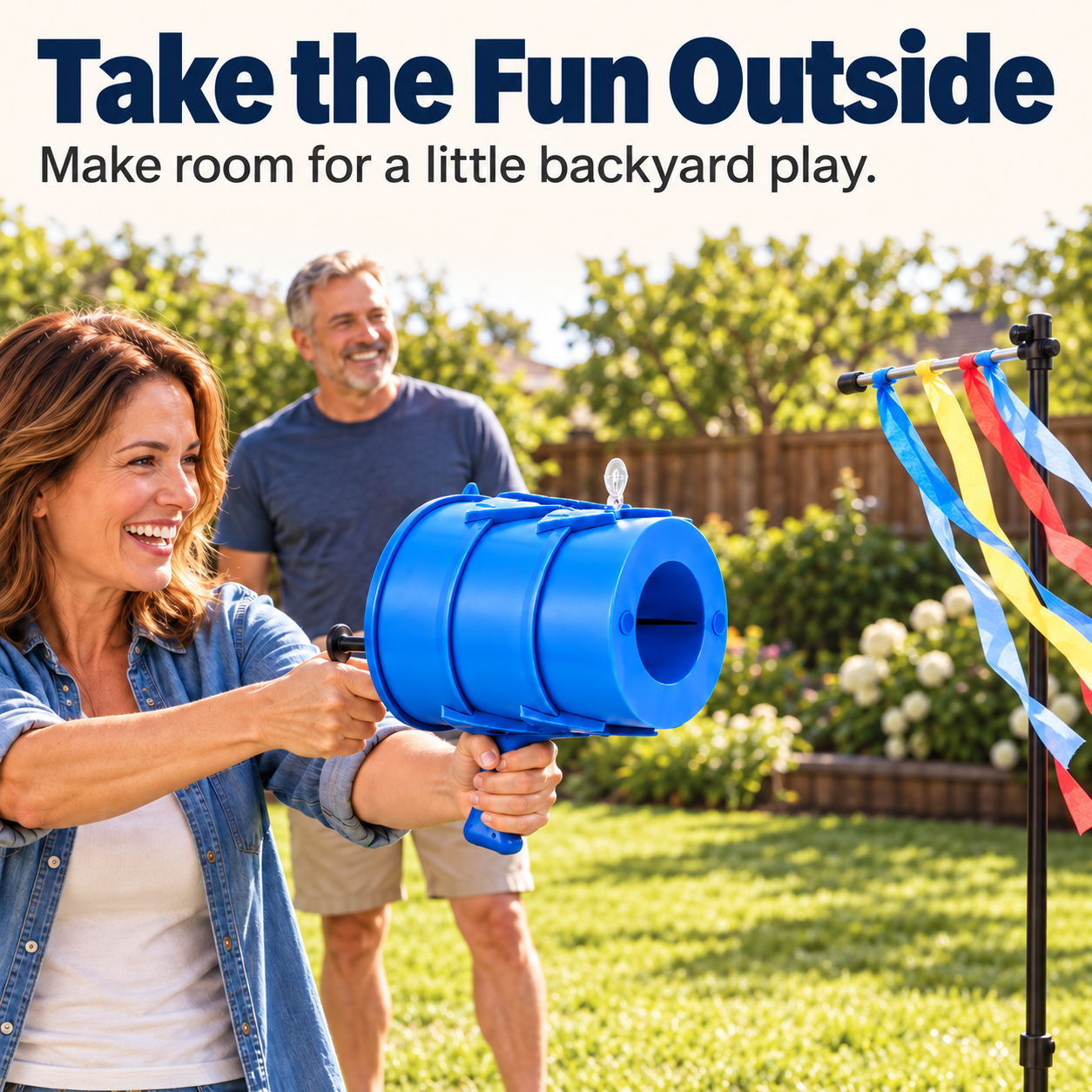 Adults enjoying a paper target activity in a dry backyard
