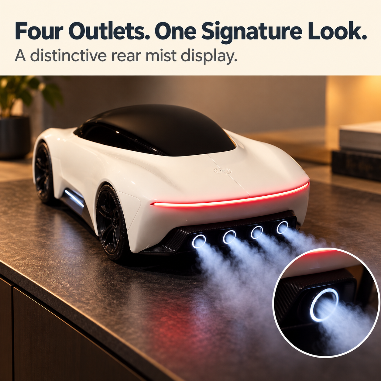 Four round rear outlets creating a white mist display