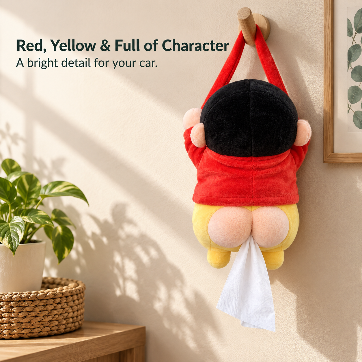 Black hair red shirt and yellow shorts on the hanging plush holder