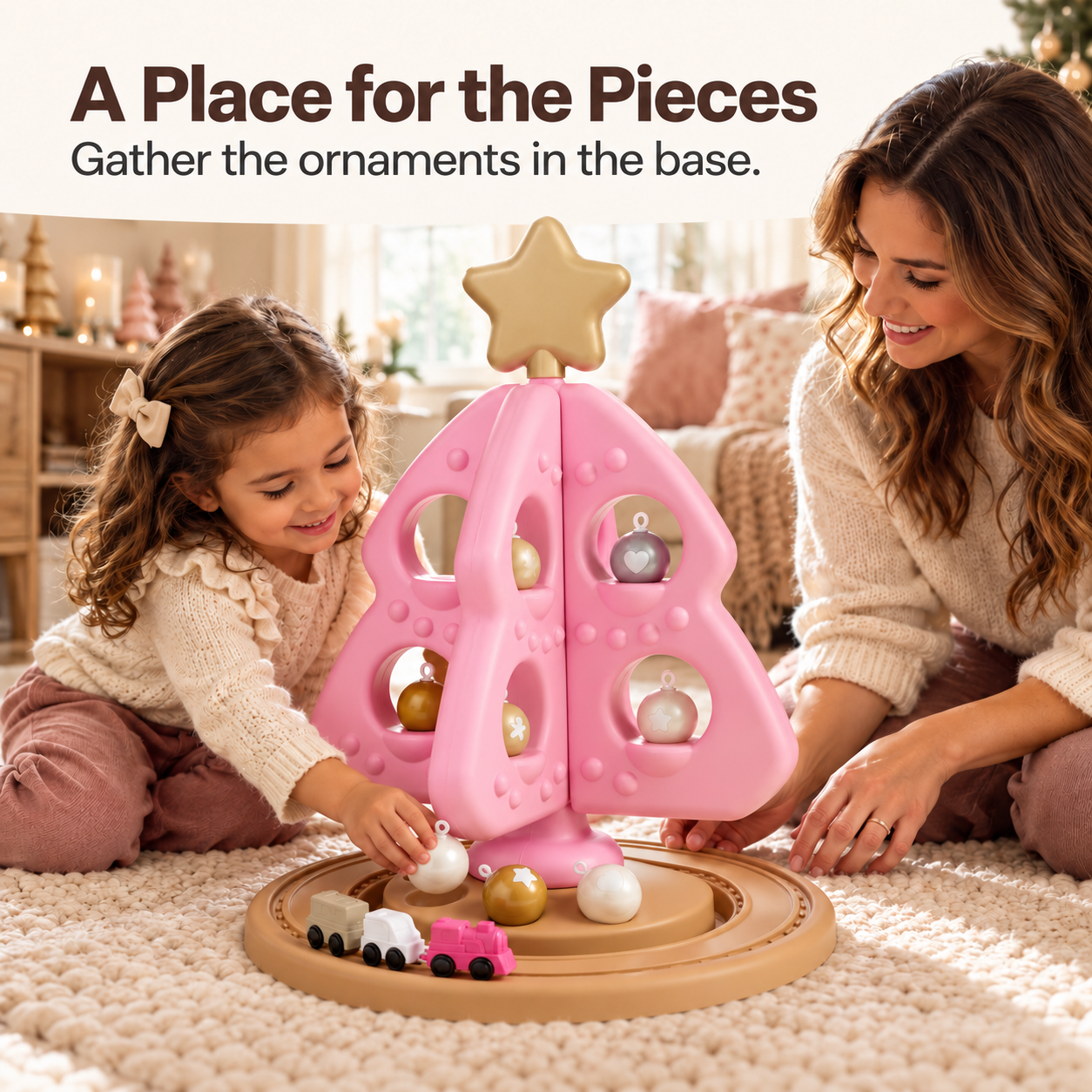 Removable Christmas ornaments stored inside the base of the pink tree